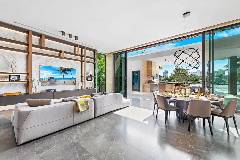 Presenting 98 La Gorce Circle, Miami Beach, Florida an extraordinary Villa Arte by Aquablue Group on Miami Beach's exclusive La Gorce Island. This stunning 7-bedrooms, 13-bathrooms residence spans 14,060 square feet, situated on a 0.76-acre lot.