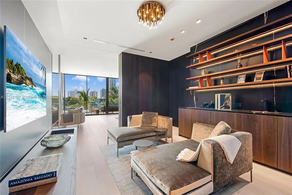Presenting 98 La Gorce Circle, Miami Beach, Florida an extraordinary Villa Arte by Aquablue Group on Miami Beach's exclusive La Gorce Island. This stunning 7-bedrooms, 13-bathrooms residence spans 14,060 square feet, situated on a 0.76-acre lot.