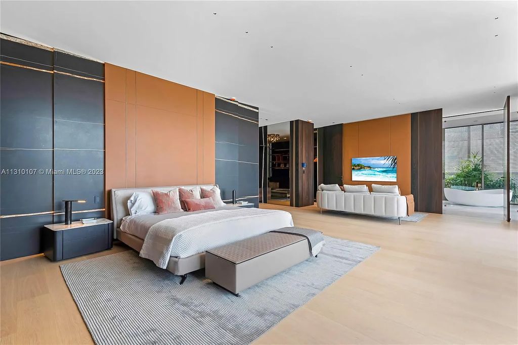 Presenting 98 La Gorce Circle, Miami Beach, Florida an extraordinary Villa Arte by Aquablue Group on Miami Beach's exclusive La Gorce Island. This stunning 7-bedrooms, 13-bathrooms residence spans 14,060 square feet, situated on a 0.76-acre lot.