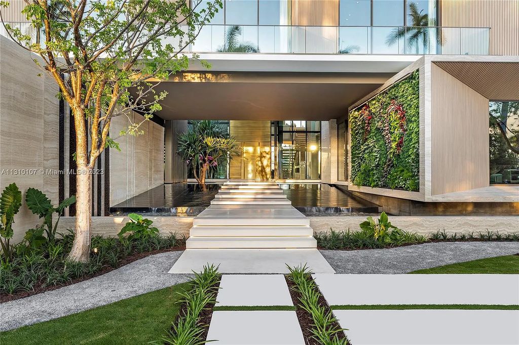 Presenting 98 La Gorce Circle, Miami Beach, Florida an extraordinary Villa Arte by Aquablue Group on Miami Beach's exclusive La Gorce Island. This stunning 7-bedrooms, 13-bathrooms residence spans 14,060 square feet, situated on a 0.76-acre lot.