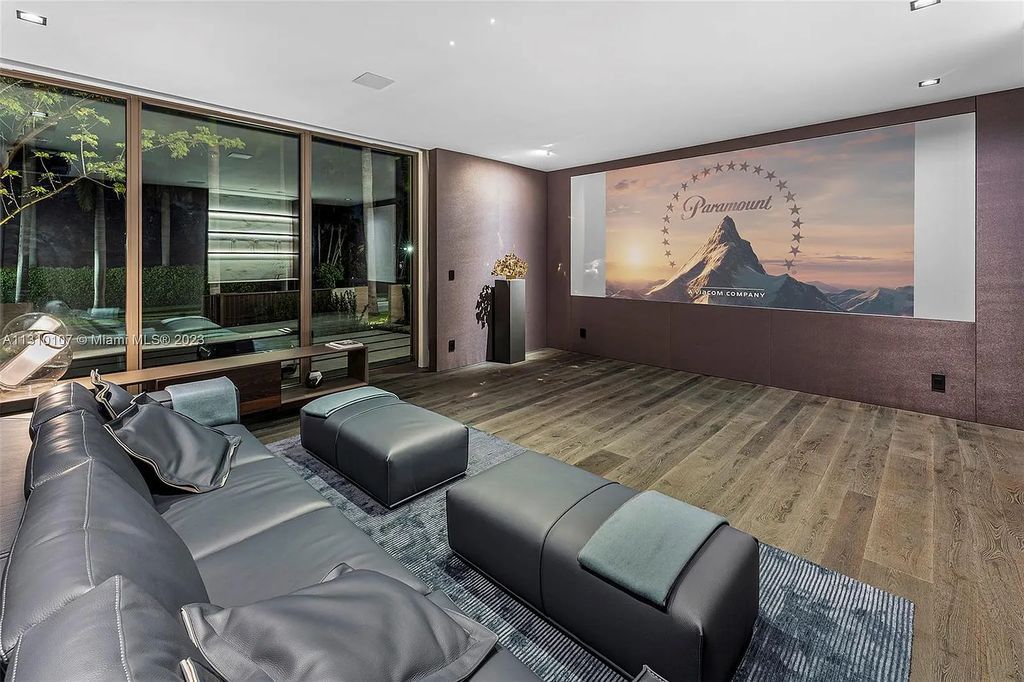 Presenting 98 La Gorce Circle, Miami Beach, Florida an extraordinary Villa Arte by Aquablue Group on Miami Beach's exclusive La Gorce Island. This stunning 7-bedrooms, 13-bathrooms residence spans 14,060 square feet, situated on a 0.76-acre lot.