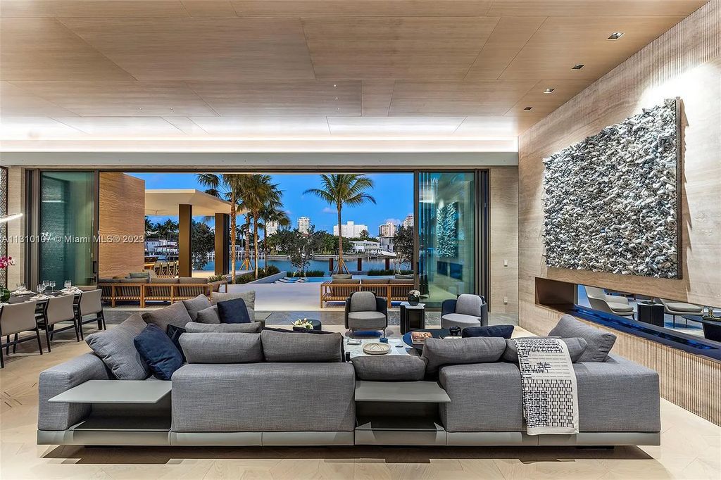 Presenting 98 La Gorce Circle, Miami Beach, Florida an extraordinary Villa Arte by Aquablue Group on Miami Beach's exclusive La Gorce Island. This stunning 7-bedrooms, 13-bathrooms residence spans 14,060 square feet, situated on a 0.76-acre lot.