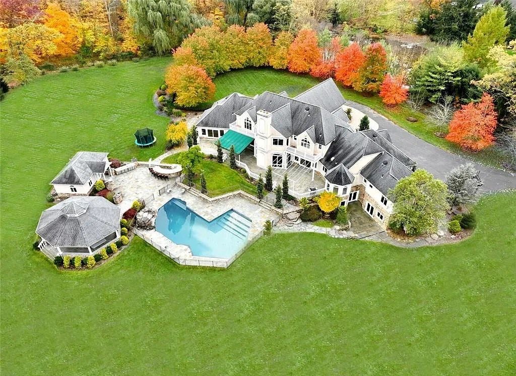 Exquisite Montebello, NY Home with Silent Forest, Scenic Views, and Private Pond, Listed at $4.999M