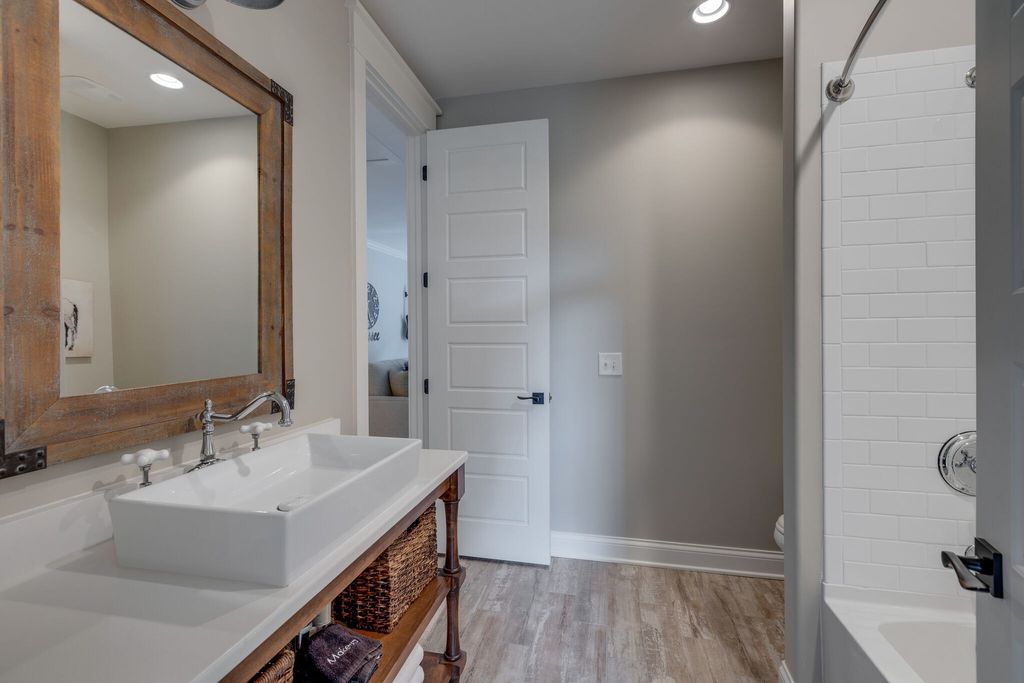 Gorgeous White Custom Farmhouse in Franklin, TN Embraces with its Warm and Welcoming Ambiance, Priced at $3.5M