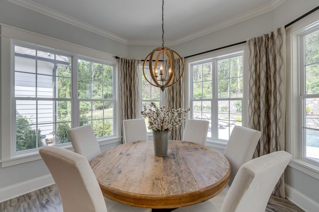 Gorgeous White Custom Farmhouse in Franklin, TN Embraces with its Warm and Welcoming Ambiance, Priced at $3.5M