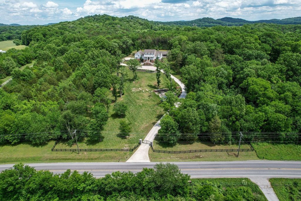 Gorgeous White Custom Farmhouse in Franklin, TN Embraces with its Warm and Welcoming Ambiance, Priced at $3.5M