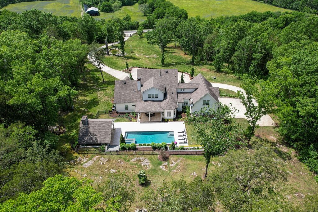 Gorgeous White Custom Farmhouse in Franklin, TN Embraces with its Warm and Welcoming Ambiance, Priced at $3.5M