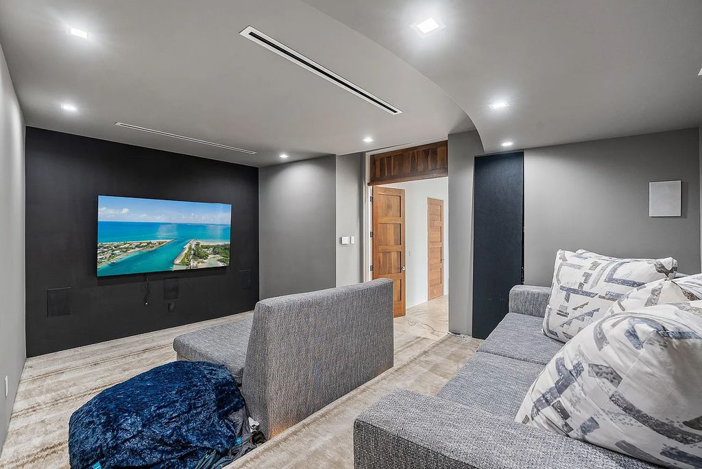 Experience luxury living at 17553 SE Conch Bar Avenue, Jupiter, Florida! This One-Of-A-Kind Grand Intracoastal Estate boasts 9 bedrooms, 10 bathrooms, and 15,066 square feet of living space on a 0.43-acre lot.