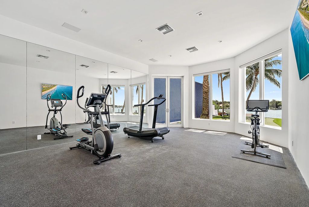 Experience luxury living at 17553 SE Conch Bar Avenue, Jupiter, Florida! This One-Of-A-Kind Grand Intracoastal Estate boasts 9 bedrooms, 10 bathrooms, and 15,066 square feet of living space on a 0.43-acre lot.