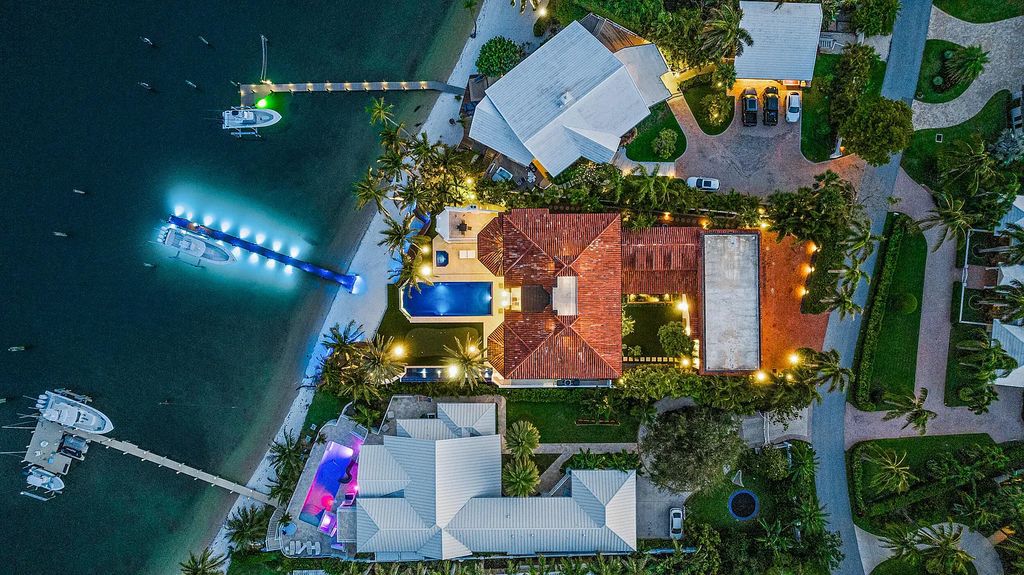 Experience luxury living at 17553 SE Conch Bar Avenue, Jupiter, Florida! This One-Of-A-Kind Grand Intracoastal Estate boasts 9 bedrooms, 10 bathrooms, and 15,066 square feet of living space on a 0.43-acre lot.