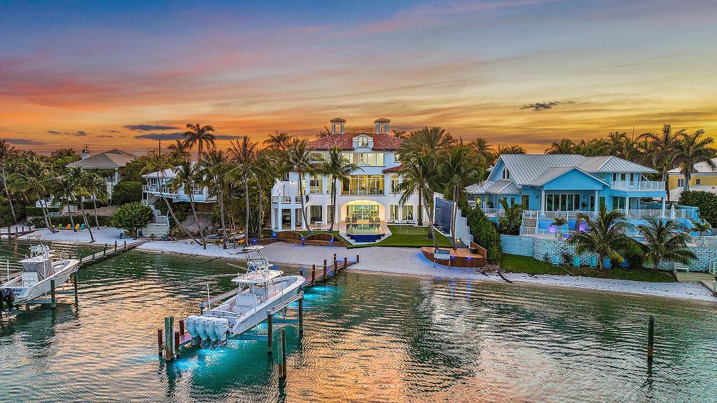Experience luxury living at 17553 SE Conch Bar Avenue, Jupiter, Florida! This One-Of-A-Kind Grand Intracoastal Estate boasts 9 bedrooms, 10 bathrooms, and 15,066 square feet of living space on a 0.43-acre lot.