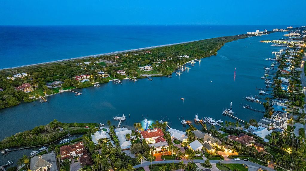 Experience luxury living at 17553 SE Conch Bar Avenue, Jupiter, Florida! This One-Of-A-Kind Grand Intracoastal Estate boasts 9 bedrooms, 10 bathrooms, and 15,066 square feet of living space on a 0.43-acre lot.