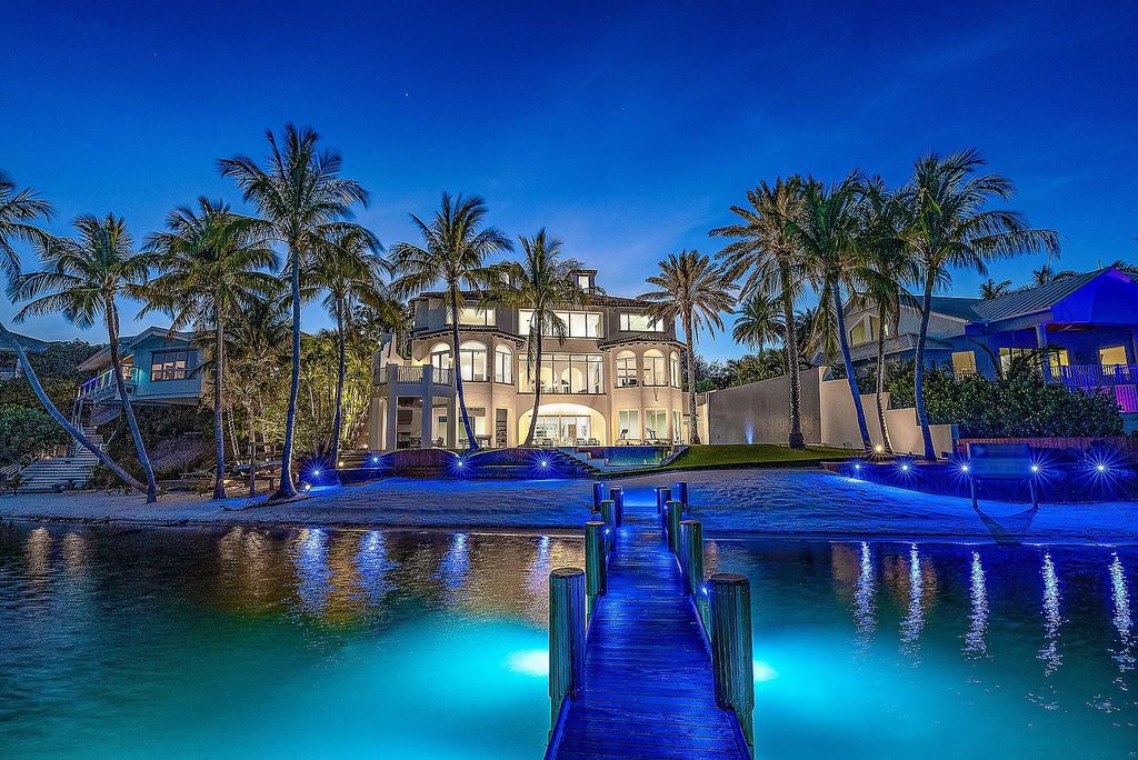 Experience luxury living at 17553 SE Conch Bar Avenue, Jupiter, Florida! This One-Of-A-Kind Grand Intracoastal Estate boasts 9 bedrooms, 10 bathrooms, and 15,066 square feet of living space on a 0.43-acre lot.
