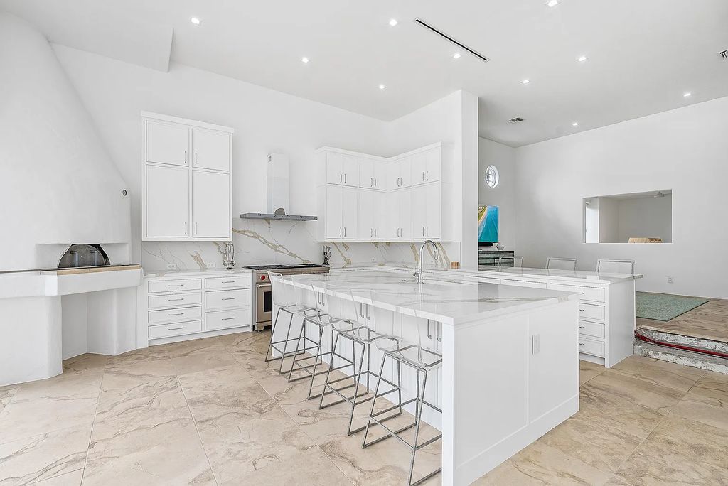 Experience luxury living at 17553 SE Conch Bar Avenue, Jupiter, Florida! This One-Of-A-Kind Grand Intracoastal Estate boasts 9 bedrooms, 10 bathrooms, and 15,066 square feet of living space on a 0.43-acre lot.