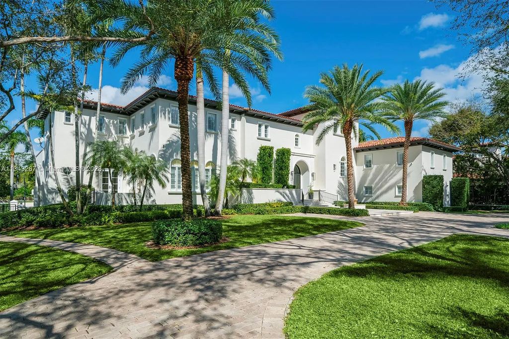 Experience luxurious waterfront living at 365 Arvida Pkwy, Coral Gables, Florida. This 11,946 sq ft masterpiece in Gables Estates offers 8 bedrooms, 11 baths, and 180 ft of waterfrontage. The main suite features a private balcony, spa-like bathroom, and walk-in closets.