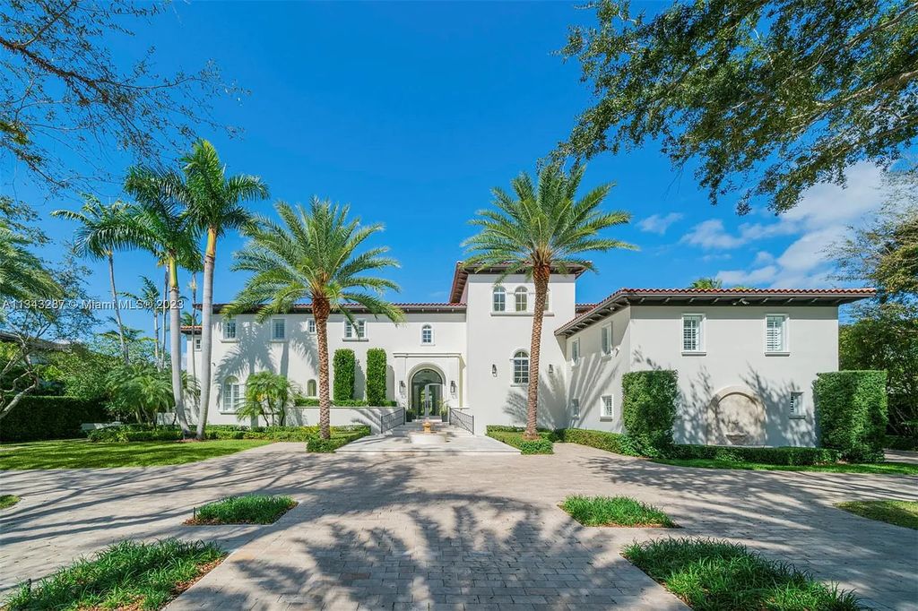 Experience luxurious waterfront living at 365 Arvida Pkwy, Coral Gables, Florida. This 11,946 sq ft masterpiece in Gables Estates offers 8 bedrooms, 11 baths, and 180 ft of waterfrontage. The main suite features a private balcony, spa-like bathroom, and walk-in closets.