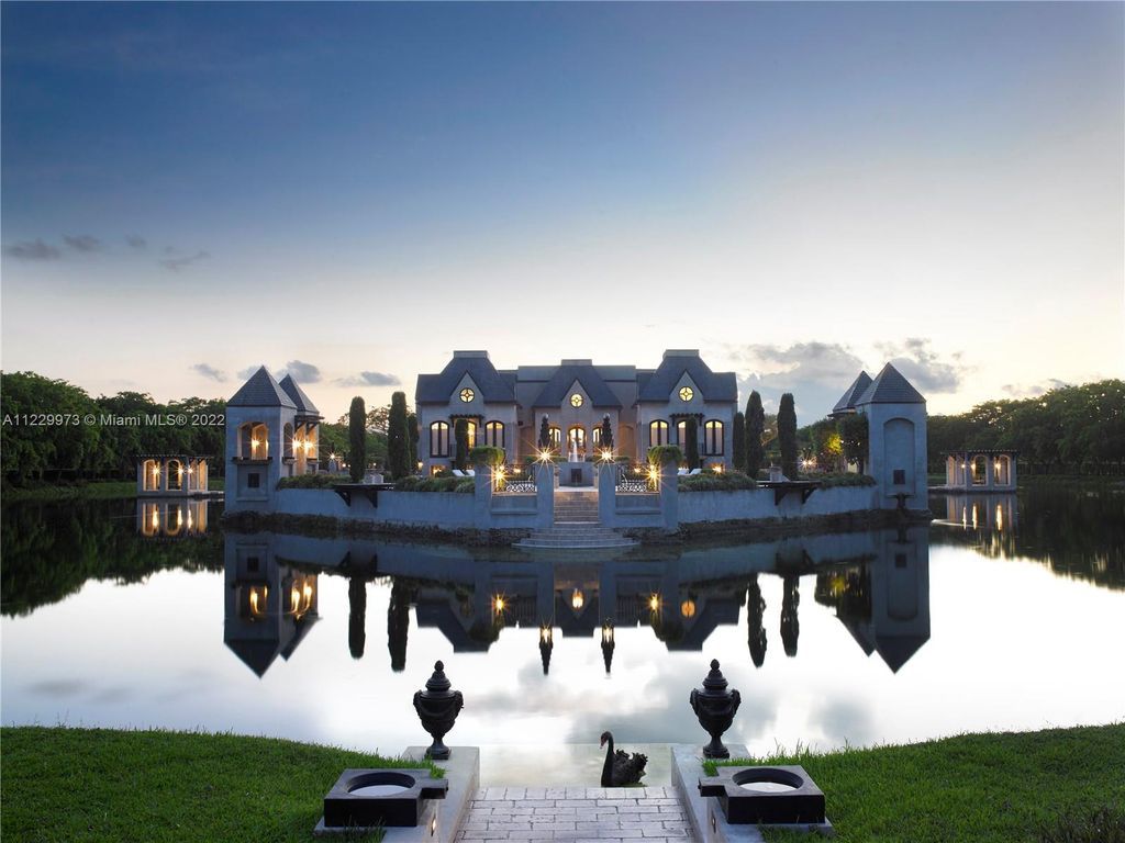 Welcome to 25791 SW 167th Avenue, Homestead, Florida - a rare chance to own the renowned mansion, designed by Architect Charles Sieger. This extraordinary 12,770 square feet estate sits on 13.74 acres in the serene Redlands area.