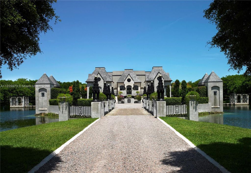 Welcome to 25791 SW 167th Avenue, Homestead, Florida - a rare chance to own the renowned mansion, designed by Architect Charles Sieger. This extraordinary 12,770 square feet estate sits on 13.74 acres in the serene Redlands area.
