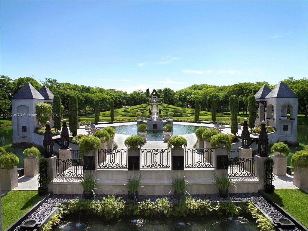 Welcome to 25791 SW 167th Avenue, Homestead, Florida - a rare chance to own the renowned mansion, designed by Architect Charles Sieger. This extraordinary 12,770 square feet estate sits on 13.74 acres in the serene Redlands area.