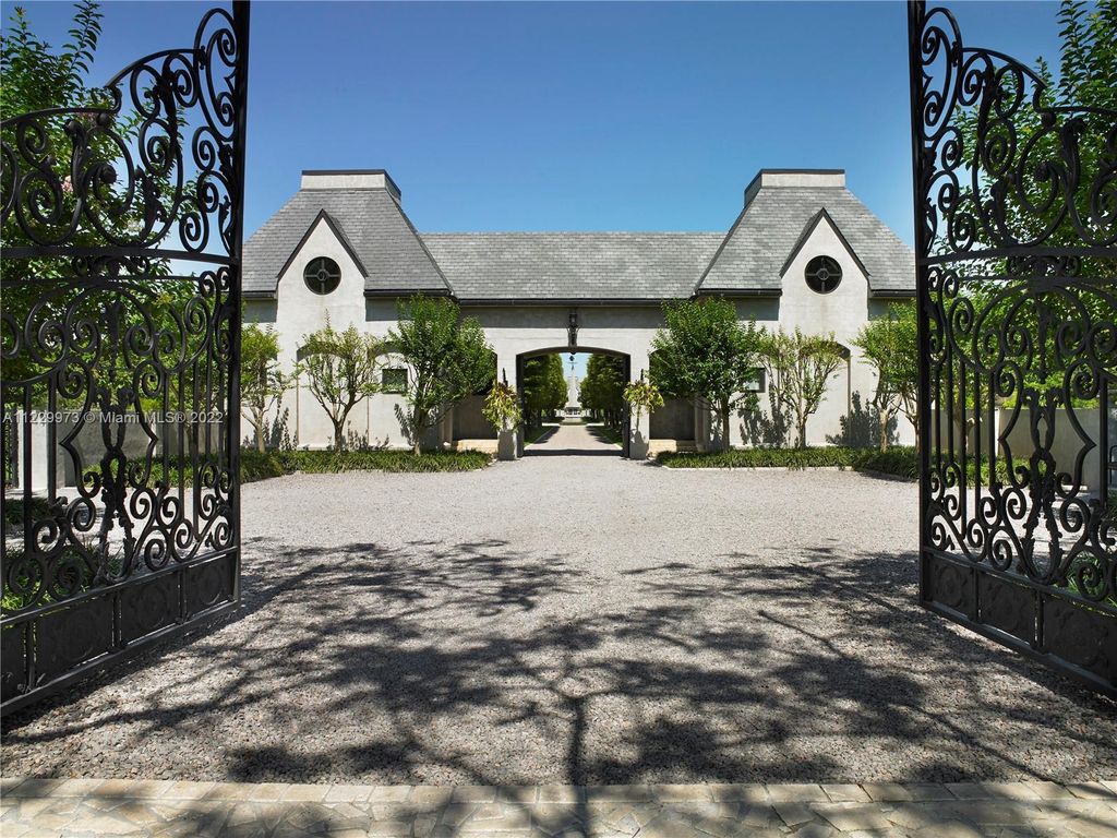 Welcome to 25791 SW 167th Avenue, Homestead, Florida - a rare chance to own the renowned mansion, designed by Architect Charles Sieger. This extraordinary 12,770 square feet estate sits on 13.74 acres in the serene Redlands area.