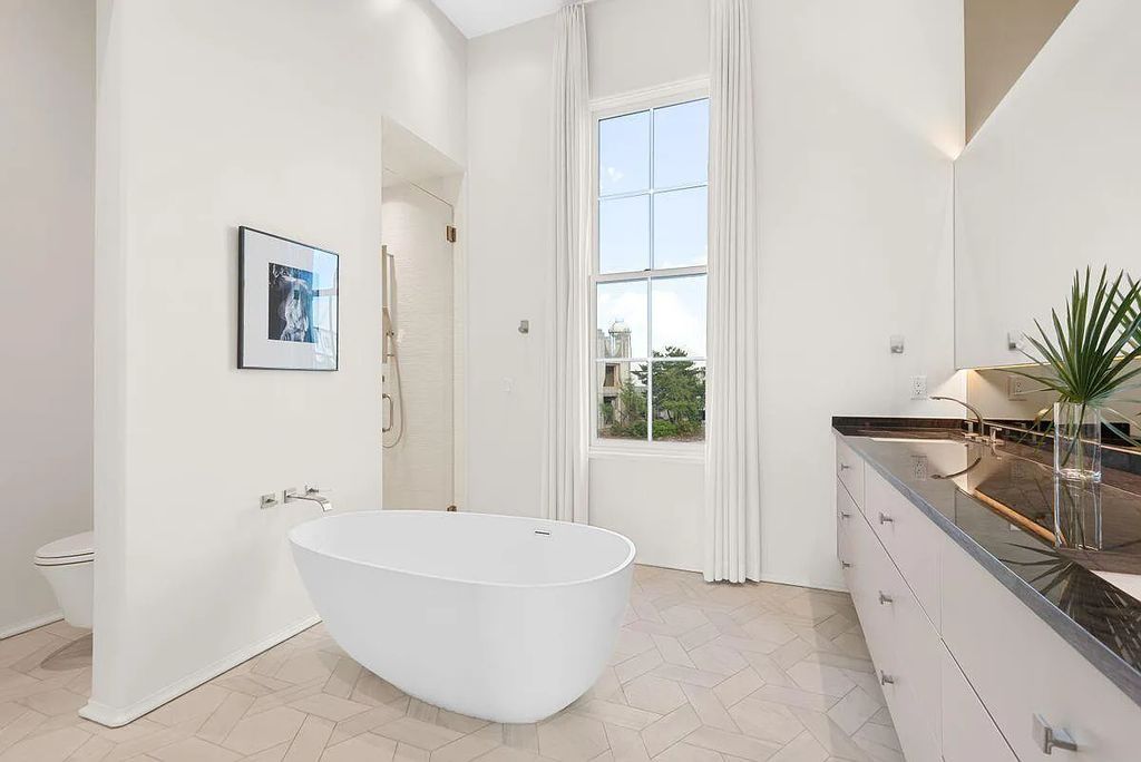 Welcome to 16 N McGee Drive, Inlet Beach, Florida, a stunning Moroccan-style home. Built in 2020, this unique property boasts 3 beds, 4 baths, and 2,741 sqft of luxurious living space.