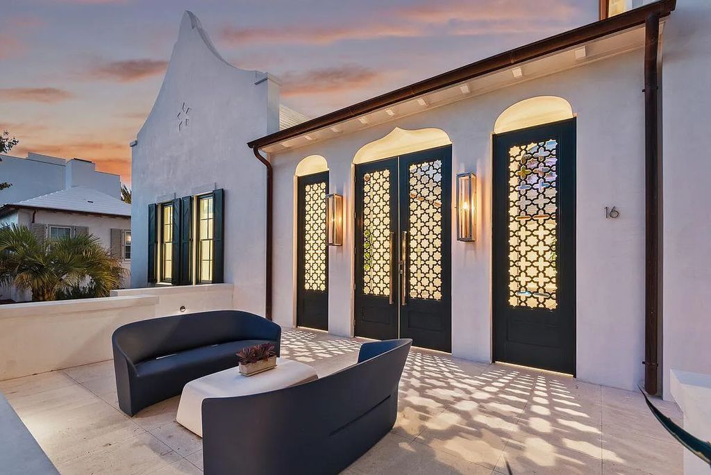 Welcome to 16 N McGee Drive, Inlet Beach, Florida, a stunning Moroccan-style home. Built in 2020, this unique property boasts 3 beds, 4 baths, and 2,741 sqft of luxurious living space.