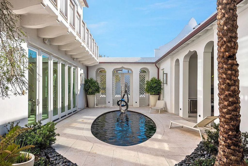 Welcome to 16 N McGee Drive, Inlet Beach, Florida, a stunning Moroccan-style home. Built in 2020, this unique property boasts 3 beds, 4 baths, and 2,741 sqft of luxurious living space.