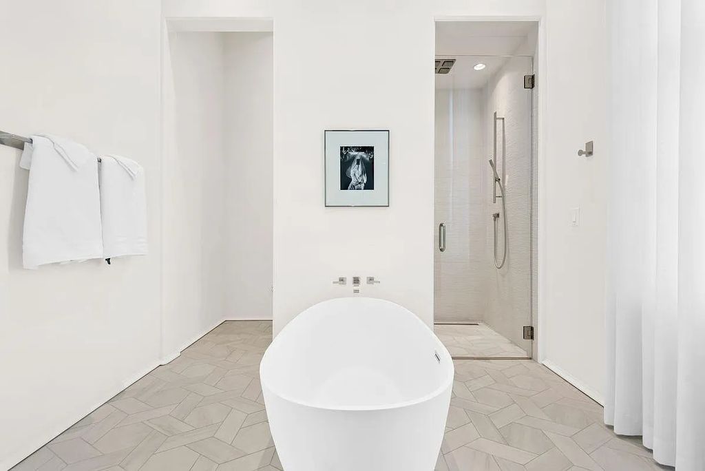 Welcome to 16 N McGee Drive, Inlet Beach, Florida, a stunning Moroccan-style home. Built in 2020, this unique property boasts 3 beds, 4 baths, and 2,741 sqft of luxurious living space.