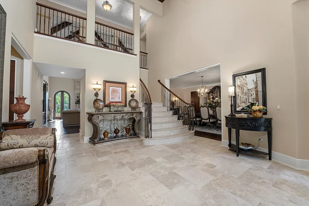 1112 Shamrock Court Home in Naperville, Illinois. Welcome to your own private resort-like manor in Naperville, one of America's top suburbs. This custom-built home by David Knecht offers over 21,000 square feet of luxury living space, including 7 bedrooms and 9.3 baths. The stunning exterior features Tudor-style brick and limestone, while the interior boasts top-of-the-line finishes and amenities. 
