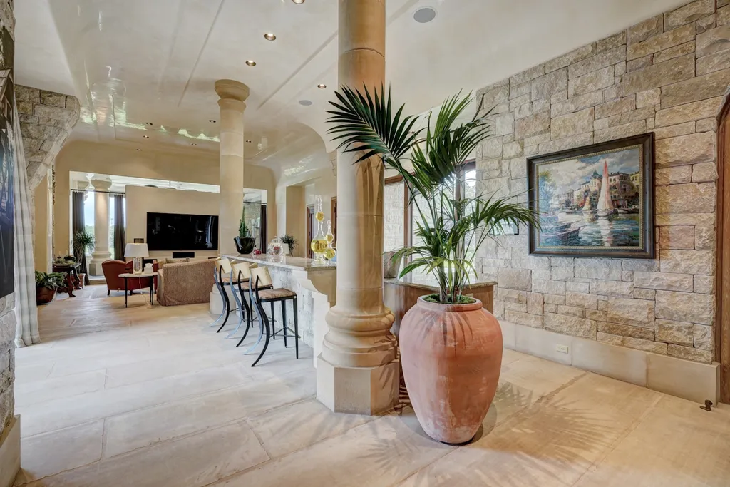 14200 Gaillardia Lane Home in Oklahoma City, Oklahoma. Nestled within the prestigious and privately gated Gaillardia Estates, this extraordinary estate designed by Jim Frazier is a true masterpiece. Situated on 3 private acres, it offers breathtaking panoramic views of holes #3 and #10 on the acclaimed Arthur Hill's Gaillardia Golf Course.