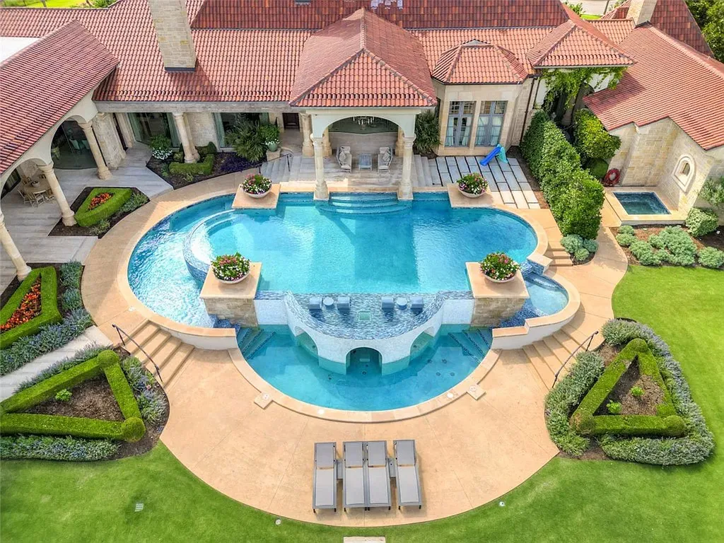 14200 Gaillardia Lane Home in Oklahoma City, Oklahoma. Nestled within the prestigious and privately gated Gaillardia Estates, this extraordinary estate designed by Jim Frazier is a true masterpiece. Situated on 3 private acres, it offers breathtaking panoramic views of holes #3 and #10 on the acclaimed Arthur Hill's Gaillardia Golf Course.