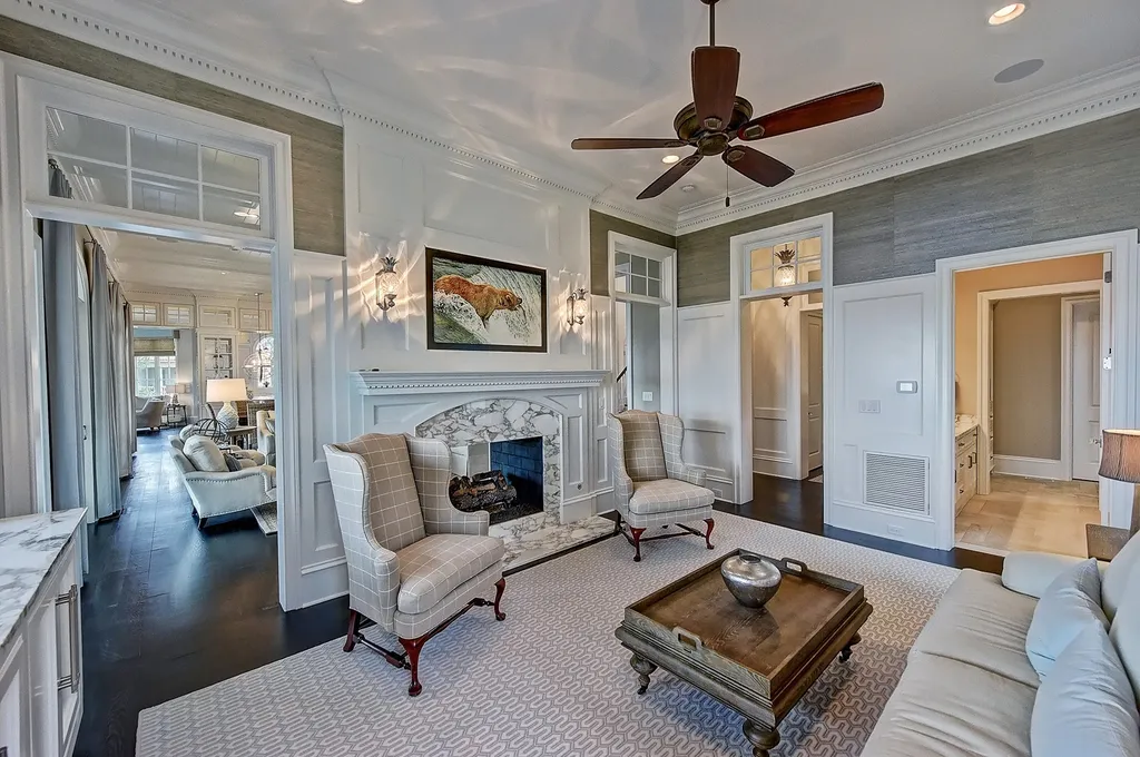Indulge in the allure and character of the New England coast with this extraordinary Lake Norman estate. As you enter through the private gated drive, you'll be greeted by lush landscaping, creating a gardener's paradise. The estate offers wide open, long-range panoramic views that will take your breath away.