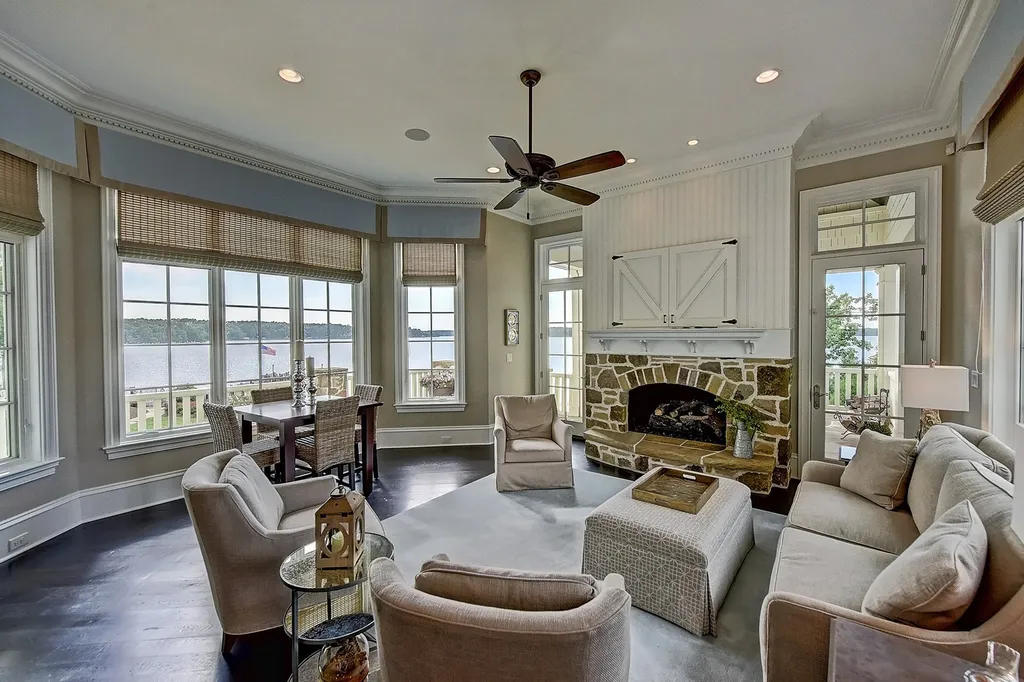 Indulge in the allure and character of the New England coast with this extraordinary Lake Norman estate. As you enter through the private gated drive, you'll be greeted by lush landscaping, creating a gardener's paradise. The estate offers wide open, long-range panoramic views that will take your breath away.