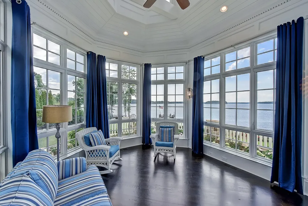 Indulge in the allure and character of the New England coast with this extraordinary Lake Norman estate. As you enter through the private gated drive, you'll be greeted by lush landscaping, creating a gardener's paradise. The estate offers wide open, long-range panoramic views that will take your breath away.