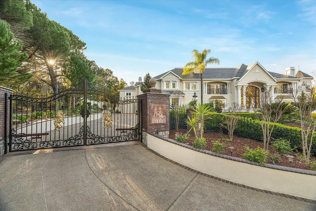 18911 Decatur Road Home in Los Gatos, California. This extraordinary estate in Monte Sereno has undergone a remarkable transformation with a remodel exceeding $5 million. It epitomizes the grandeur of a sprawling European luxury property, occupying a pristine and expansive 1.37-acre flat lot. This extraordinary estate in Monte Sereno has undergone a remarkable transformation with a remodel exceeding $5 million. It epitomizes the grandeur of a sprawling European luxury property, occupying a pristine and expansive 1.37-acre flat lot. The impressive slate roof structure encompasses approximately 17,000 square feet, boasting 10 bedrooms, 8 bathrooms, a separate guest house, an apartment, a 10-car garage, an elevator, an underground shooting range, an indoor basketball/racket ball court, a USTA tennis court, a resort-style lap pool, a great room, a home theatre, a bonus room, two formal libraries, and a home gym.