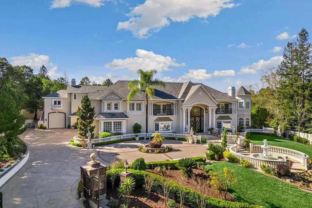 18911 Decatur Road Home in Los Gatos, California. This extraordinary estate in Monte Sereno has undergone a remarkable transformation with a remodel exceeding $5 million. It epitomizes the grandeur of a sprawling European luxury property, occupying a pristine and expansive 1.37-acre flat lot. This extraordinary estate in Monte Sereno has undergone a remarkable transformation with a remodel exceeding $5 million. It epitomizes the grandeur of a sprawling European luxury property, occupying a pristine and expansive 1.37-acre flat lot. The impressive slate roof structure encompasses approximately 17,000 square feet, boasting 10 bedrooms, 8 bathrooms, a separate guest house, an apartment, a 10-car garage, an elevator, an underground shooting range, an indoor basketball/racket ball court, a USTA tennis court, a resort-style lap pool, a great room, a home theatre, a bonus room, two formal libraries, and a home gym.
