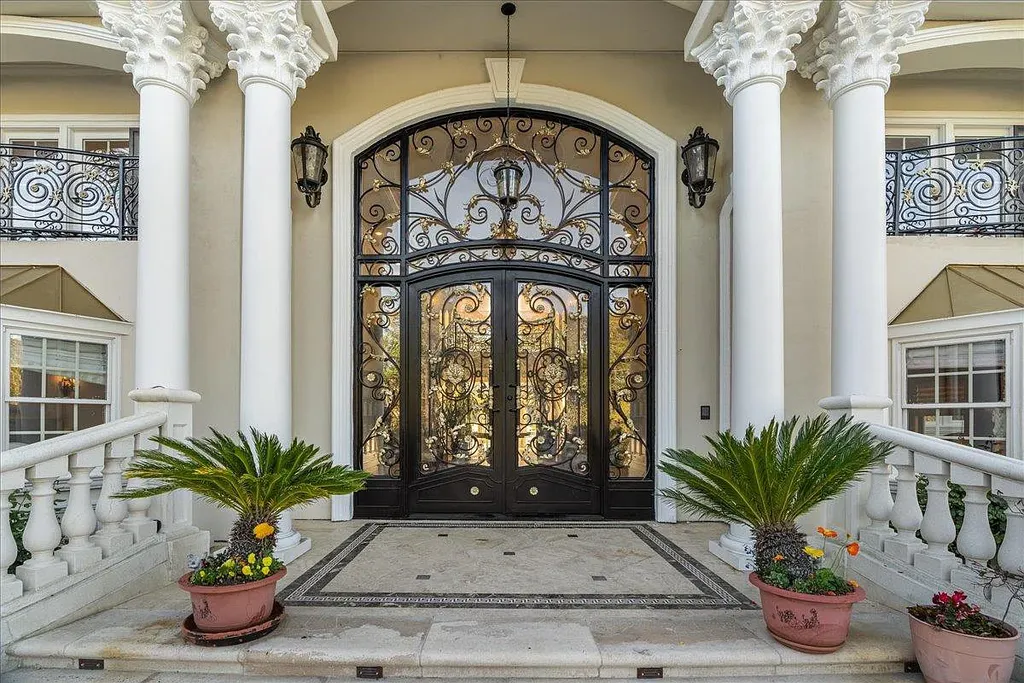 18911 Decatur Road Home in Los Gatos, California. This extraordinary estate in Monte Sereno has undergone a remarkable transformation with a remodel exceeding $5 million. It epitomizes the grandeur of a sprawling European luxury property, occupying a pristine and expansive 1.37-acre flat lot. This extraordinary estate in Monte Sereno has undergone a remarkable transformation with a remodel exceeding $5 million. It epitomizes the grandeur of a sprawling European luxury property, occupying a pristine and expansive 1.37-acre flat lot. The impressive slate roof structure encompasses approximately 17,000 square feet, boasting 10 bedrooms, 8 bathrooms, a separate guest house, an apartment, a 10-car garage, an elevator, an underground shooting range, an indoor basketball/racket ball court, a USTA tennis court, a resort-style lap pool, a great room, a home theatre, a bonus room, two formal libraries, and a home gym.