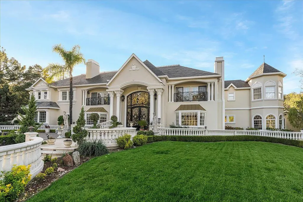 18911 Decatur Road Home in Los Gatos, California. This extraordinary estate in Monte Sereno has undergone a remarkable transformation with a remodel exceeding $5 million. It epitomizes the grandeur of a sprawling European luxury property, occupying a pristine and expansive 1.37-acre flat lot. This extraordinary estate in Monte Sereno has undergone a remarkable transformation with a remodel exceeding $5 million. It epitomizes the grandeur of a sprawling European luxury property, occupying a pristine and expansive 1.37-acre flat lot. The impressive slate roof structure encompasses approximately 17,000 square feet, boasting 10 bedrooms, 8 bathrooms, a separate guest house, an apartment, a 10-car garage, an elevator, an underground shooting range, an indoor basketball/racket ball court, a USTA tennis court, a resort-style lap pool, a great room, a home theatre, a bonus room, two formal libraries, and a home gym.