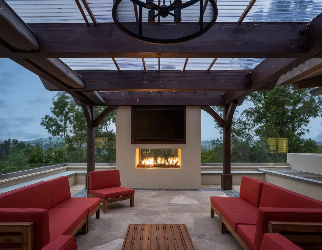 25120 Jim Bridger Road Home in Hidden Hills, California. Situated on a spacious lot of nearly one and a half acres in the prestigious Ashley Ridge enclave of Hidden Hills, a guard-gated community, this custom-designed estate spans 16,000 square feet and showcases impeccable details against a backdrop of breathtaking canyon views.