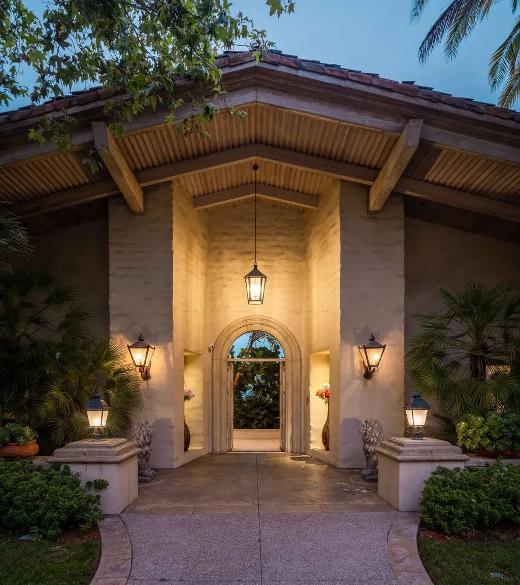 25120 Jim Bridger Road Home in Hidden Hills, California. Situated on a spacious lot of nearly one and a half acres in the prestigious Ashley Ridge enclave of Hidden Hills, a guard-gated community, this custom-designed estate spans 16,000 square feet and showcases impeccable details against a backdrop of breathtaking canyon views.