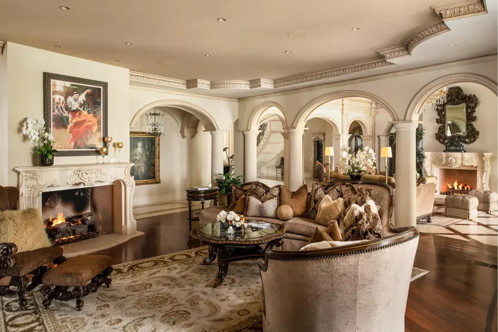 25365 Prado De La Felicidad Home in Calabasas, California. Calabasas, California - Prepare to be captivated by one of the most stunning properties in all of Calabasas. This extraordinary architectural masterpiece showcases French influence and design, nestled behind the prestigious second gate in The Estates at The Oaks. Situated on over 1.1 acres of land and boasting panoramic city and mountain views, this residence is a true testament to luxury and craftsmanship.