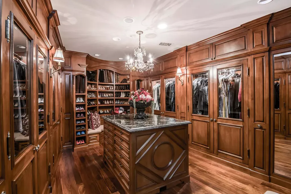 25365 Prado De La Felicidad Home in Calabasas, California. Calabasas, California - Prepare to be captivated by one of the most stunning properties in all of Calabasas. This extraordinary architectural masterpiece showcases French influence and design, nestled behind the prestigious second gate in The Estates at The Oaks. Situated on over 1.1 acres of land and boasting panoramic city and mountain views, this residence is a true testament to luxury and craftsmanship.