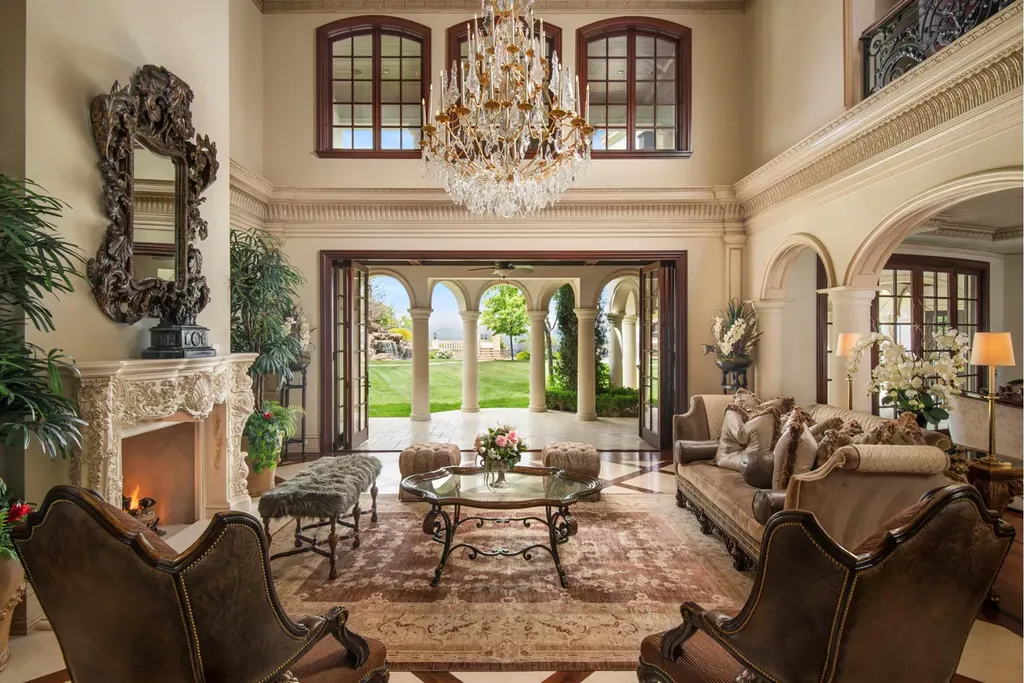 25365 Prado De La Felicidad Home in Calabasas, California. Calabasas, California - Prepare to be captivated by one of the most stunning properties in all of Calabasas. This extraordinary architectural masterpiece showcases French influence and design, nestled behind the prestigious second gate in The Estates at The Oaks. Situated on over 1.1 acres of land and boasting panoramic city and mountain views, this residence is a true testament to luxury and craftsmanship.