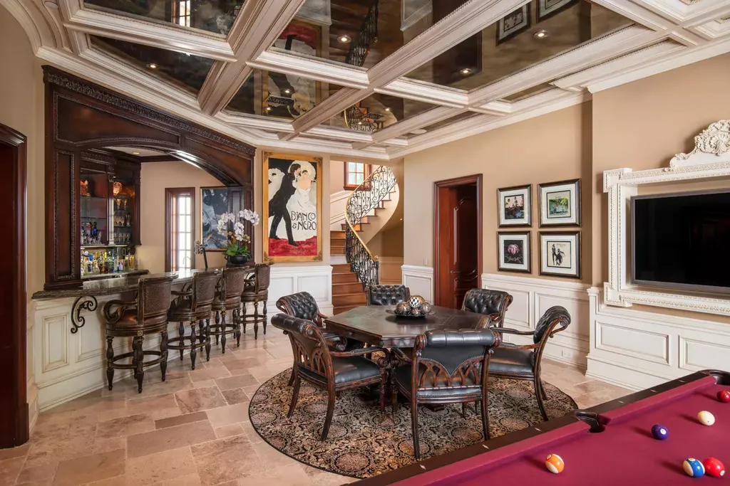 25365 Prado De La Felicidad Home in Calabasas, California. Calabasas, California - Prepare to be captivated by one of the most stunning properties in all of Calabasas. This extraordinary architectural masterpiece showcases French influence and design, nestled behind the prestigious second gate in The Estates at The Oaks. Situated on over 1.1 acres of land and boasting panoramic city and mountain views, this residence is a true testament to luxury and craftsmanship.