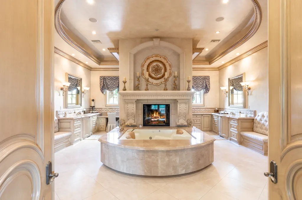 27 Eagles Landing Lane Home in Las Vegas, Nevada. Welcome to the prestigious Southern Highlands Golf Club, where you'll find the iconic Mediterranean estate at 27 Eagles Landing Lane. This custom-designed home offers an unmatched living experience, boasting captivating views of the city, mountains, and golf course. Every detail of this Richard Luke masterpiece has been meticulously crafted, from the architectural iron details to the Turkish marble floors.