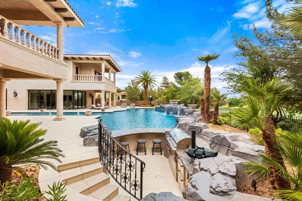27 Eagles Landing Lane Home in Las Vegas, Nevada. Welcome to the prestigious Southern Highlands Golf Club, where you'll find the iconic Mediterranean estate at 27 Eagles Landing Lane. This custom-designed home offers an unmatched living experience, boasting captivating views of the city, mountains, and golf course. Every detail of this Richard Luke masterpiece has been meticulously crafted, from the architectural iron details to the Turkish marble floors.