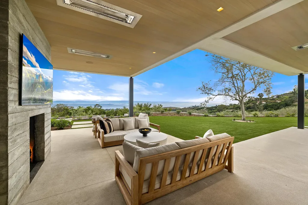 2957 E Valley Road Home in Santa Barbara, California. Embark on an extraordinary journey as you step into this newly completed, expertly designed compound boasting breathtaking ocean, mountain, and hillside views. With a harmonious blend of modern aesthetics and a romantic ambiance, this property is a testament to patience and the pursuit of perfection. Welcome to a haven where high design seamlessly merges with relaxed livability, creating an unparalleled living experience.
