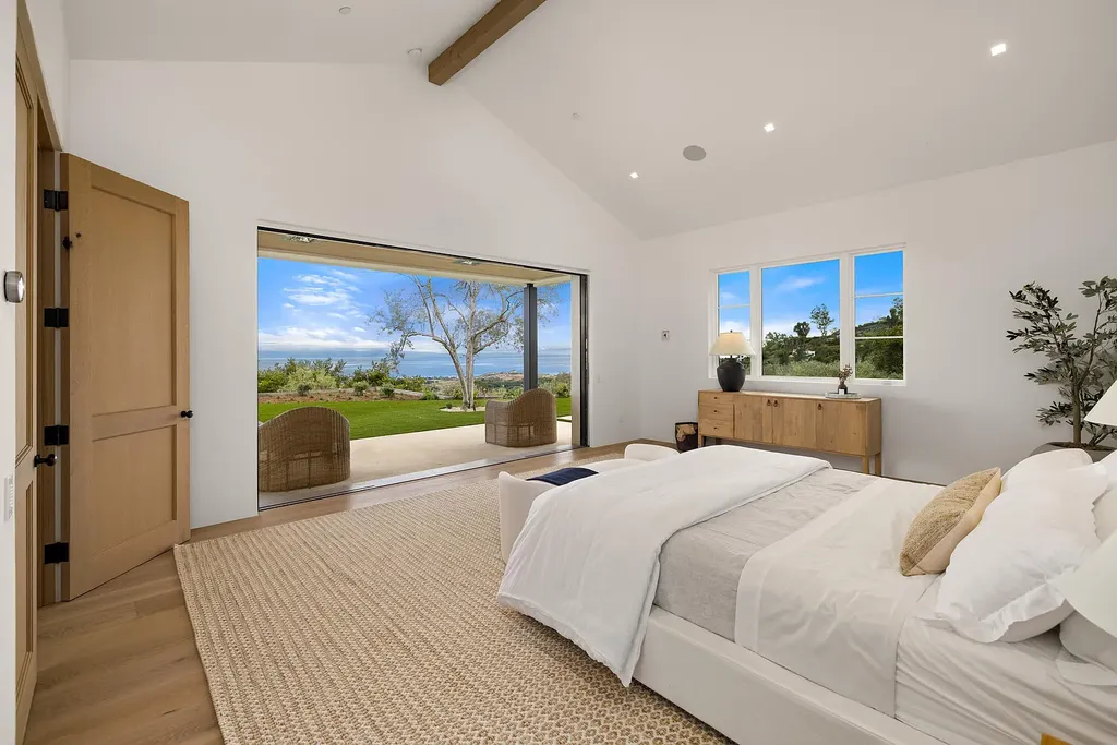 2957 E Valley Road Home in Santa Barbara, California. Embark on an extraordinary journey as you step into this newly completed, expertly designed compound boasting breathtaking ocean, mountain, and hillside views. With a harmonious blend of modern aesthetics and a romantic ambiance, this property is a testament to patience and the pursuit of perfection. Welcome to a haven where high design seamlessly merges with relaxed livability, creating an unparalleled living experience.