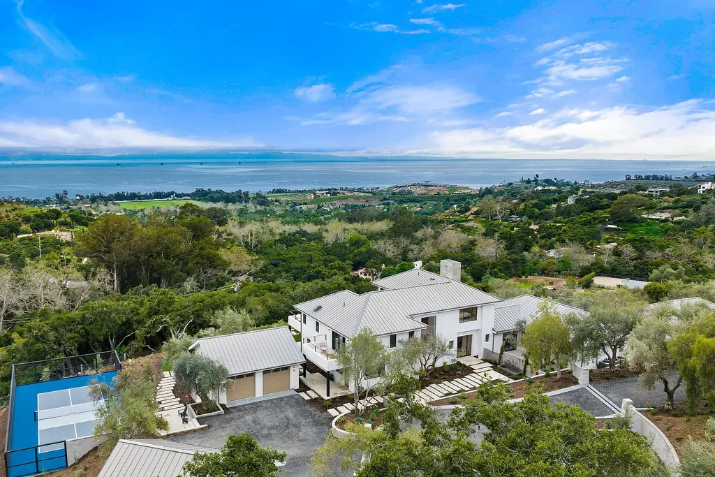 2957 E Valley Road Home in Santa Barbara, California. Embark on an extraordinary journey as you step into this newly completed, expertly designed compound boasting breathtaking ocean, mountain, and hillside views. With a harmonious blend of modern aesthetics and a romantic ambiance, this property is a testament to patience and the pursuit of perfection. Welcome to a haven where high design seamlessly merges with relaxed livability, creating an unparalleled living experience.