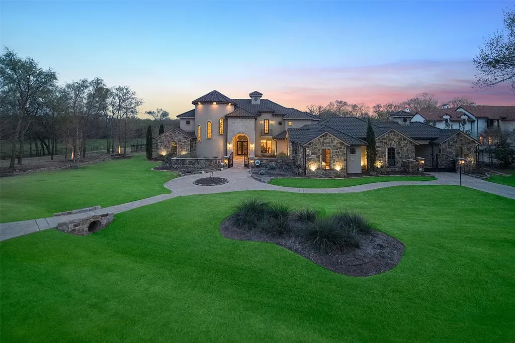 Experience the perfect blend of Texas Hill Country charm and modern urban living in this exceptional 5-bedroom, 6-bathroom home located on a peaceful cul-de-sac and nestled on 2.3 acres of scenic beauty, with the added advantage of being adjacent to an equestrian farm. The thoughtfully designed interiors showcase light woods, warm stones, and expansive windows, creating inviting and bright spaces throughout.